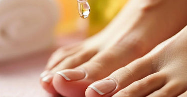 A close-up of freshly pedicured feet with vibrant nail polish