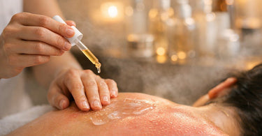 A person applying a soothing aloe vera gel to reddened skin on their shoulder, representing post-sauna folliculitis care in a spa setting