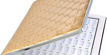 Professional nail polish color display book with 120 sample slots open on a salon table