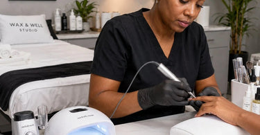 Benefits of Keeping Backup Power Cords For Nail Equipment: A protective case with extra cables in a nail salon for professional use and business continuity.