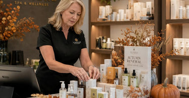 Seasonal retail display in a spa reception area featuring summer products and natural elements to boost sales