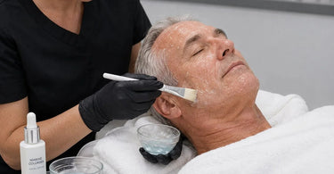 Marine collagen professional facial products arranged on a spa treatment table with shells and blue accents