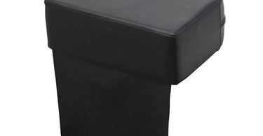 Booster Seat by Deco Salon Furniture placed on a black styling chair in a professional salon, showcasing its sleek design and comfortable padding.