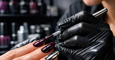 A nail technician applying a flawless gel polish manicure to a client's nail, showcasing professional tools and a high-gloss finish.