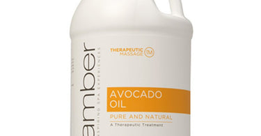 One gallon jug of pure, unrefined avocado carrier oil by Amber Products for professional spa and salon use.