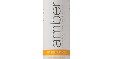Carrier Oil - Hazelnut Oil / 8 oz. by Amber Products, a professional-grade facial and body oil for salons and spas, shown in its elegant bottle.