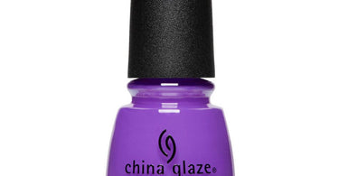 China Glaze Stop Beachfrontin' nail polish bottle showing beautiful coral-pink tropical shade