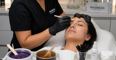 Comparison of hard wax and soft wax products for professional brow waxing services