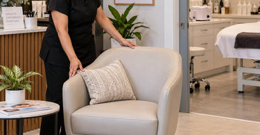 Professional waiting room chairs arranged in a stylish beauty salon or spa reception area