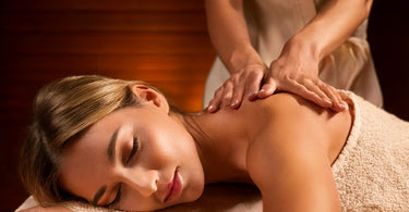 Client peacefully sleeping during a relaxing massage at a spa