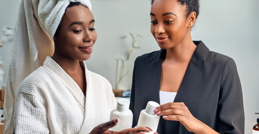 Clients buying retail products at a spa after treatments