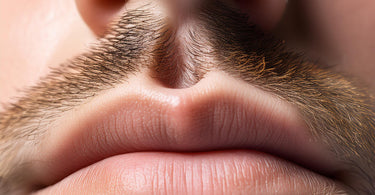 Close-up of nose hair waxing in progress