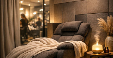 A serene and peaceful treatment room in a busy salon designed as a sensory deprivation zone, featuring soft lighting, a luxurious massage table, and calming decor to promote relaxation and client bliss.