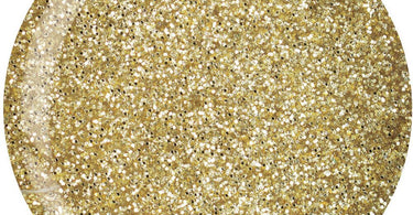 Cuccio Pro Rich Gold Glitter Dip Powder jar on a salon nail table showing the sparkly texture and professional packaging.