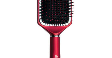 Diane Royal Satin 13-Row Large Square Paddle Brush on a stylist's station