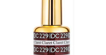 Close-up photo of DND DC Mermaid Gel Polish in shade 229 Claret, a shimmering wine-red holographic nail color in its professional bottle.