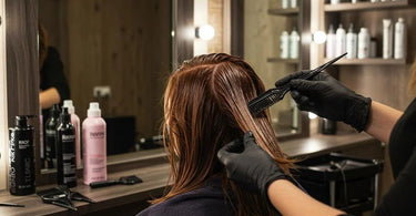 Professional hair color application in a salon