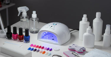 Essential nail salon supplies for startup businesses, including nail polish, tools, and equipment