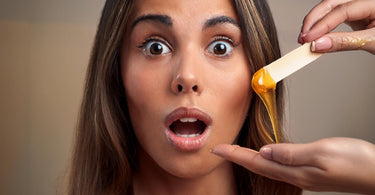 Female spa client looking scared before a Brazilian wax.