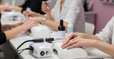 Nail salon equipment including nail tables, drills, and lamps