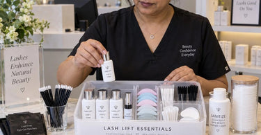 Professional lash lift supply kit with lifting solutions, shields, applicators, and aftercare products for salon technicians