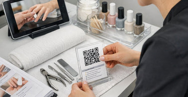 Salon and spa staff training library with binders, QR codes, and quick refresher materials for team education