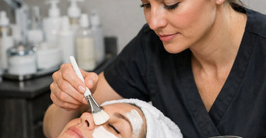 Salon owner calculating true hourly rate with calculator, spa supplies, and financial charts representing profit margin analysis and business cost breakdown
