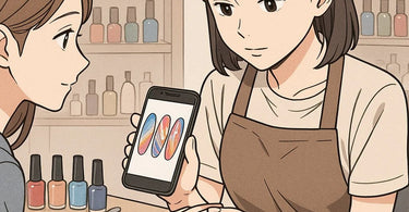 Nail technician working on client's nails with Pinterest inspiration photos visible on phone