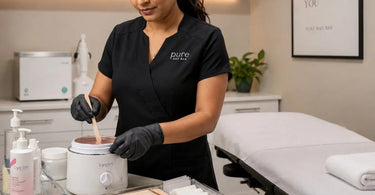A serene spa treatment room set up for a relaxing facial, featuring professional equipment and a calming ambiance.