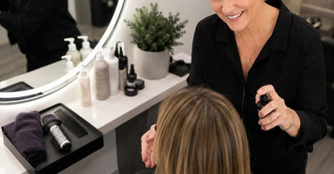Spa professional offering an express service with a complete and luxurious experience for a female client