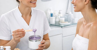 Professional hard waxing service setup with wax warmer, spatulas, and hygiene supplies for client confidence