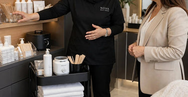 Spa professional arranging supplies at proper height to reduce shoulder strain