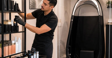 A pristine salon retail display featuring skincare and nail products, protected from spray tan overspray