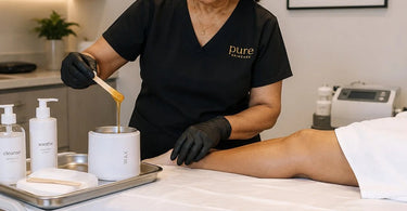 Treatment table with spill and protective covering, demonstrating how to prevent product stains in a spa or salon.