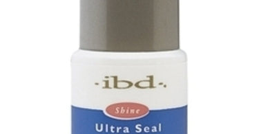 IBD Ultra Seal Clear 0.5 oz bottle, a professional no-wipe gel top coat for nails