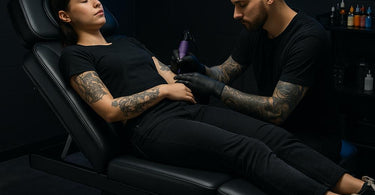 DIR Tranquility 4-Motor Medical Spa Treatment Table in a professional tattoo studio setting
