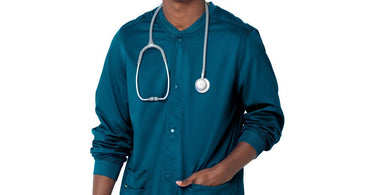 Landau Proflex Men's Warm-Up Jacket in Caribbean blue, shown on a professional in a spa setting