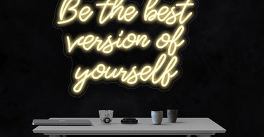 LED Flex Neon Sign reading 'Be the best version of yourself' in a warm pink glow, mounted on a clear acrylic backing, ideal for salon or spa decor.