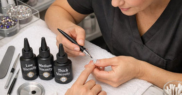 Comparison chart showing thin, medium, and thick viscosity rhinestone placement adhesives with examples of best uses for each type on nail art designs