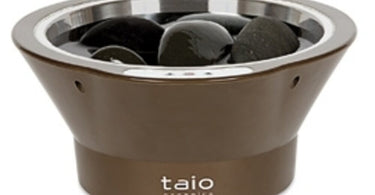 Small Treatment Bowl by Taio Organics shown on a spa table with other professional tools
