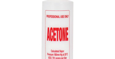 Soft 'N Style Imprinted Twist Top Acetone Bottle shown in a professional salon setting