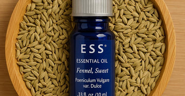 ESS Pure Essential Sweet Fennel Oil bottle with fresh fennel seeds and herbs