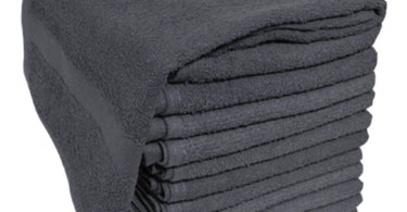 Soft 'N Style Gray Terry Towels stacked neatly for spa and salon use
