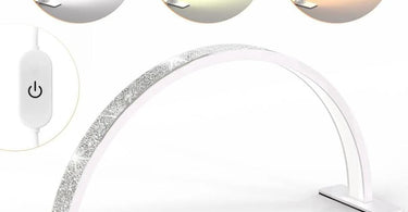 Gelaxy Half Moon LED Manicure Lamp with crystal accents, curing a client's gel polish in a modern nail salon