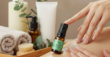Tea tree oil bottle with fresh tea tree leaves, symbolizing natural post-waxing care