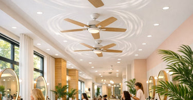 Stylish ceiling fan installation in a modern professional hair salon, highlighting airflow and interior design