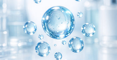 Close-up visual representation of hyaluronic acid molecules of different sizes hydrating layers of skin