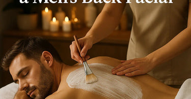 Professional spa therapist performing a men's back facial treatment