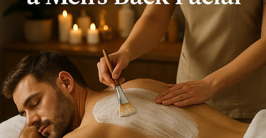 Professional spa therapist performing a men's back facial treatment