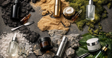 A world map with natural skincare ingredients like lavender, almonds, and green leaves overlaid on different geographic regions, illustrating the concept of terroir in beauty.
